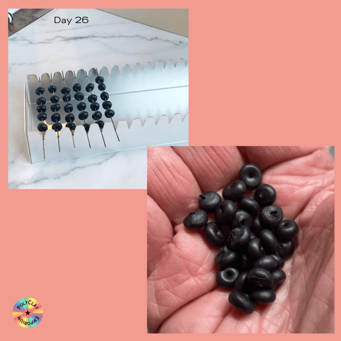 Small black polymer clay spacer beads.